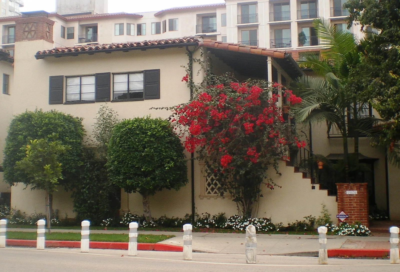 Illustrative Spanish-style courtyard apartment building in Westwood, Los Angeles